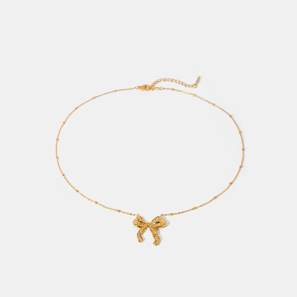 Collier avec pendentif en forme de nœud en acier inoxydable