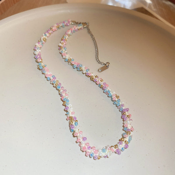 Collier de perles de riz en acier titane